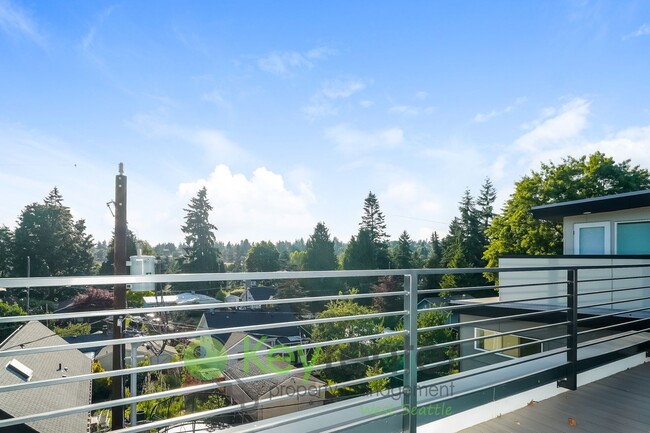 Building Photo - Skyline Chic: Modern Living with a Rooftop...
