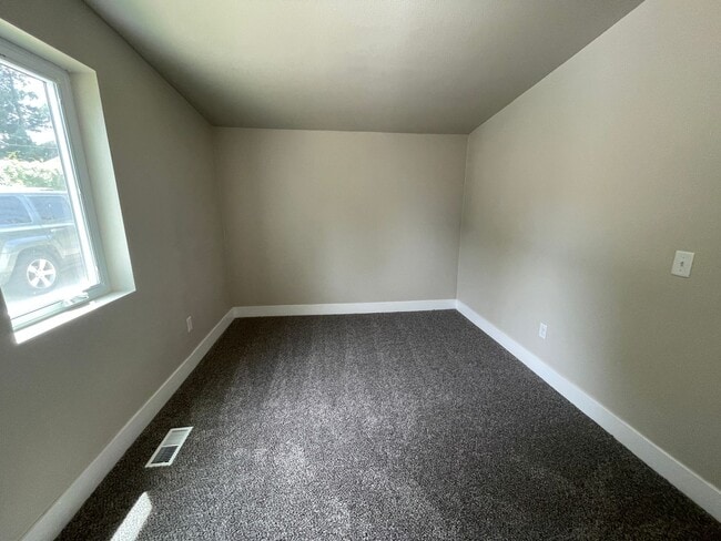 Building Photo - Two Bedroom One Stall Detached Garage
