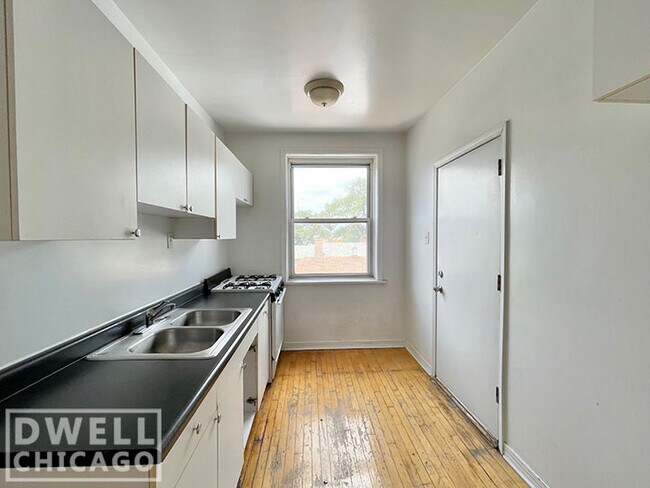 Foto del edificio - 3044 W Wellington Ave