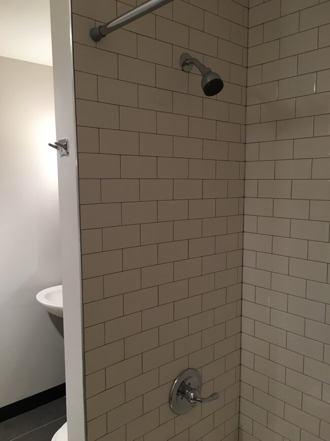 Shower tile - 4860 Garrison St