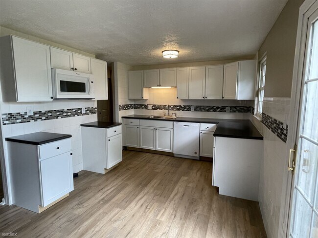 Building Photo - 4 br, 2.5 bath House - 6630 Cordova Drive