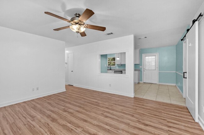 Building Photo - Charming Pace 3BR Home with Bonus Room, Gazebo Patio & Fenced Yard!