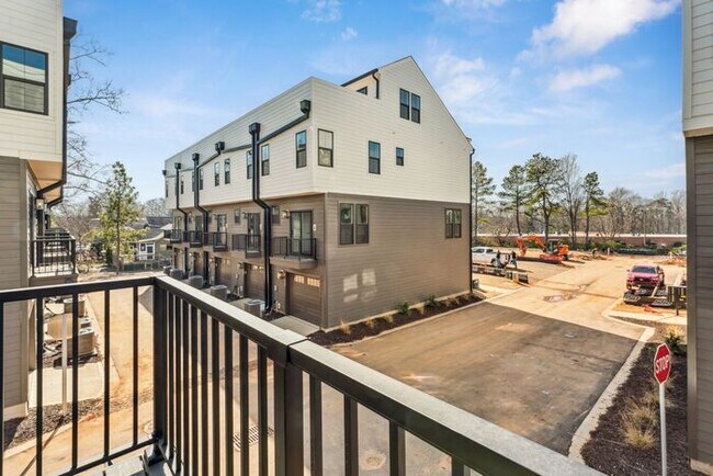 Building Photo - High-End 2BR Townhome | Rooftop Terrace + 2-Car Garage | 24-Unit Community