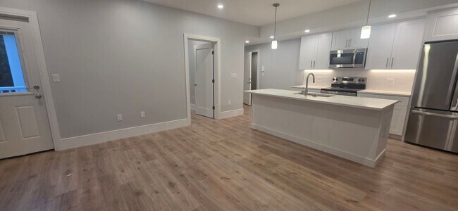 Foto del edificio - Get $1,000 on closing! NO FEE BRAND NEW LUXURY CONSTRUCTION, LAUNDRY IN UNIT, PARKING INCLUDED