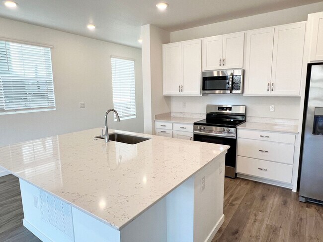 Building Photo - Brand New Home with a Fenced Yard and Cove...