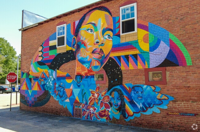Hidden Figures mural in Downtown Garner by Garden of Journey celebrates local influential people of color.