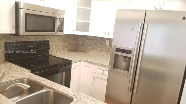 Building Photo - 8999 SW 123rd Ct
