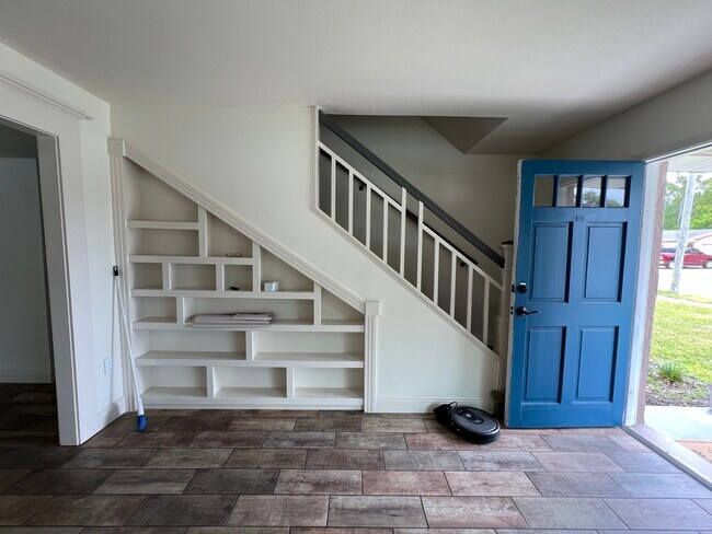 Staircase shelf in Living Room - 7243 Amhurst Way