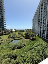 Building Photo - 10275 Collins Ave