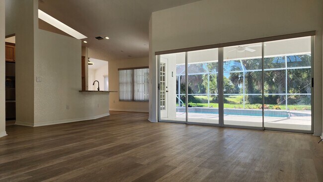 Building Photo - Fresh Paint, New Floors, and a Heated Pool - Move-In Ready!