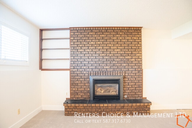 Building Photo - Basement Suite With Assigned Parking, BONU...