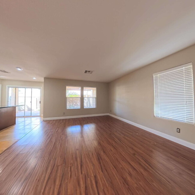 Building Photo - Stunning 2-Story Home with a Bedroom downstairs and a Backyard Oasis.