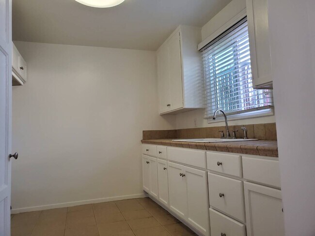 Spacious cabinets and storage in the newly painted kitchen - 4138 Redondo Beach Blvd