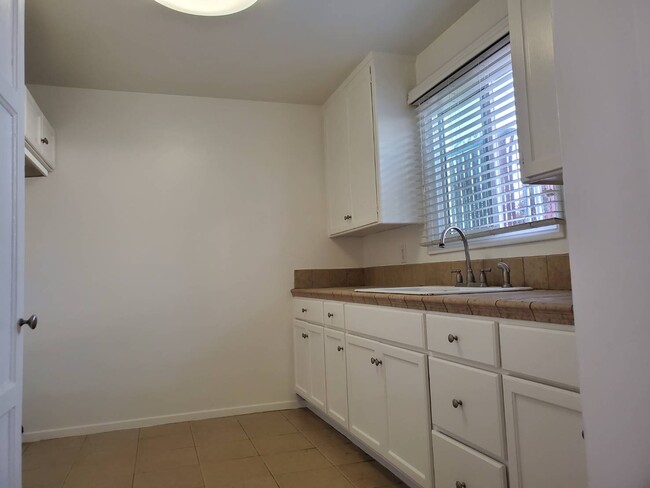 Spacious cabinets and storage in the newly painted kitchen - 4138 Redondo Beach Blvd