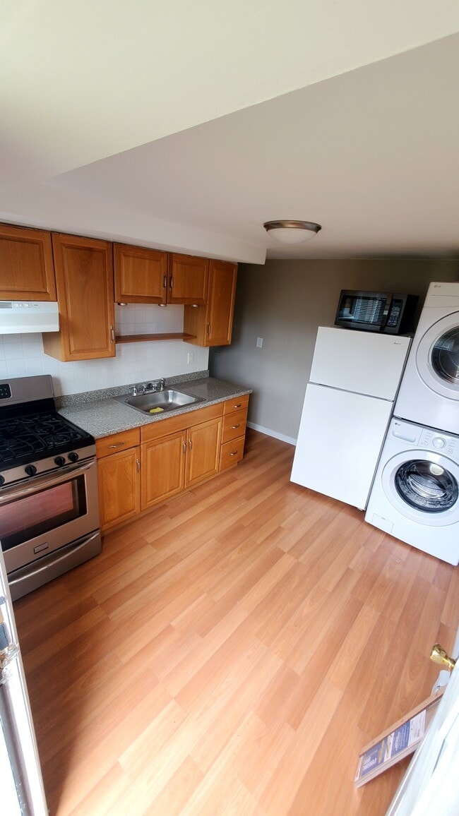 Kitchen with washer/ dryer - 119 Myrtle Ave