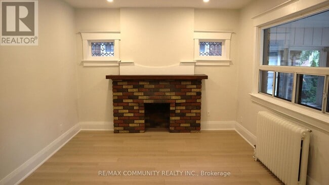 Building Photo - 731 Coxwell Ave