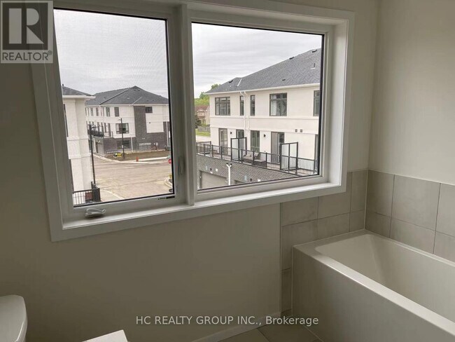 Photo du bâtiment - 12 Terrace Bay Ln