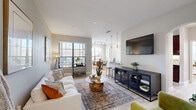 Located at 18545 University Blvd in Sugar Land, TX, this thoughtfully designed 2-bedroom, 2-bathroom residence offers a comfortable and functional single-floor layout. Light-toned hardwood-style flooring flows throughout, complementing the neutral palette of the soft gray walls and crisp white trim.

The open-concept living and dining area is bright and inviting, with large windows fitted with horizontal blinds that allow generous natural light. The living room offers a relaxed atmosphere, while the adjacent dining area includes a door providing direct access to the outdoors.

The kitchen is well-equipped with rich, dark wood cabinetry, granite countertops, stainless steel appliances including a range, microwave, and refrigerator, along with track lighting overhead. A pantry provides additional storage convenience.

The primary bedroom features dual windows that flood the space with natural light, a ceiling fan, and access to a generously sized walk-in closet with multi-tier shelving rods. The second bedroom is versatile and also benefits from natural light and a ceiling fan. Each bathroom is appointed with granite-topped vanities, dark wood cabinetry, and a tub-shower combination. The unit also includes a dedicated laundry space and multiple closets throughout for ample storage.