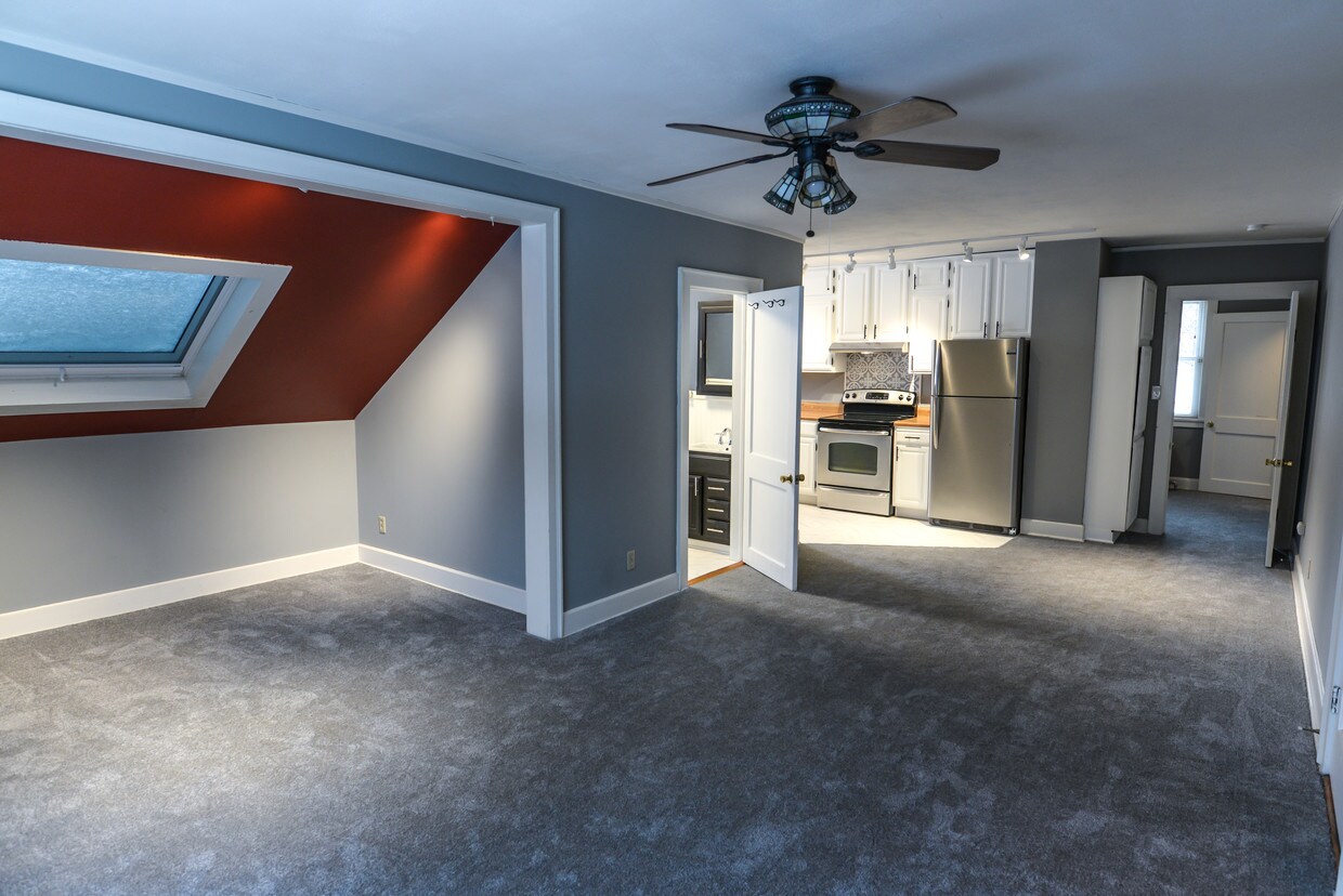 Spacious Living Room + Den - 2800 S 32nd Ave