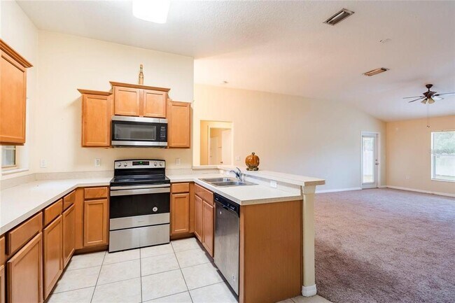 Foto del edificio - 8117 Alamosa Wood Ave
