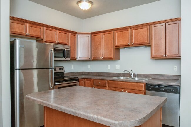 124 N Hyland #104 | Kitchen - Triangle Apartments