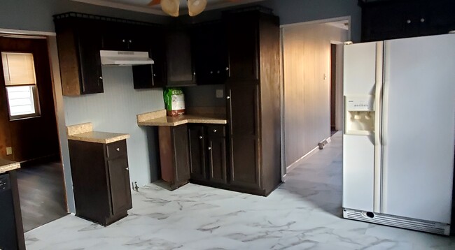 kitchen - range has been installed - 23 Railroad St