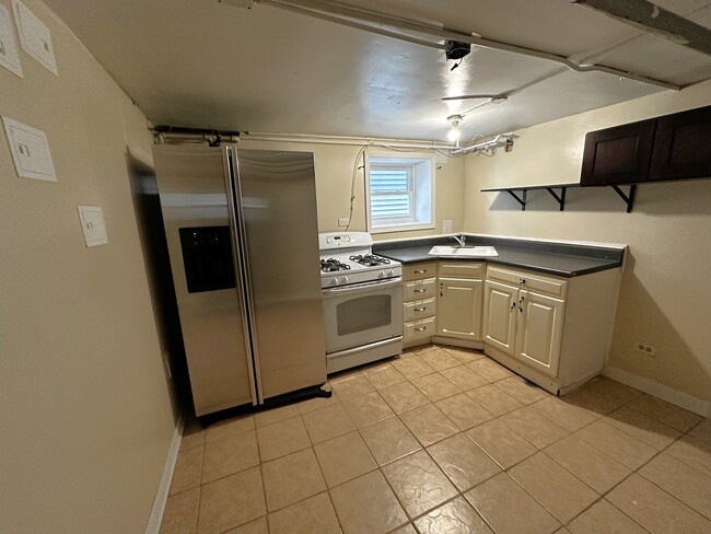 Building Photo - 4431 S Sacramento Ave