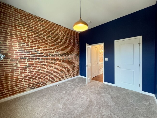 Photo - Modern 2-Bedroom Townhome with Stylish Fea...