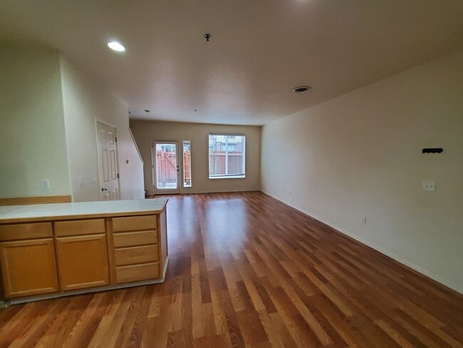 Photo - Great Location! 2 Bed 2 Bath Townhouse Style Condo! Open Concept! Laminate Floors Throughout Main!