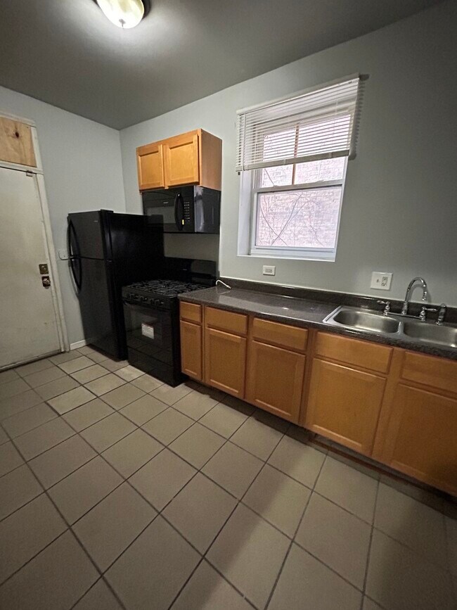 Foto del edificio - 6607 S Greenwood Ave