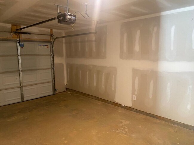 Building Photo - Three Bed Two and a Half Bath Townhome for...