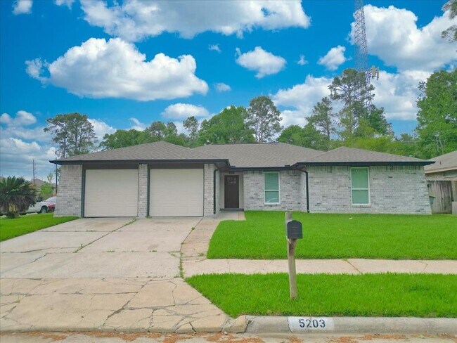 Foto del edificio - 5203 Mossgrey Ln