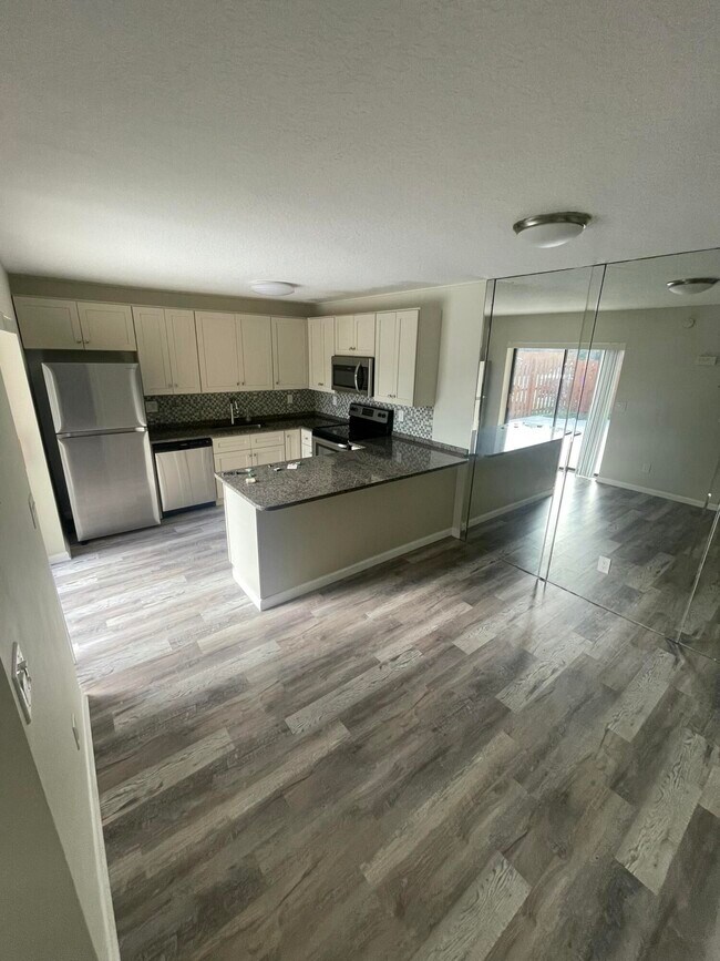 Foto del edificio - 5881 SE Windsong Ln