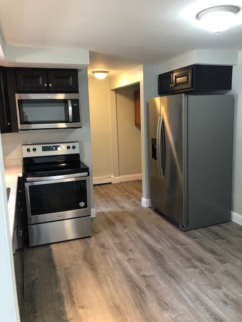 Kitchen with stainless appliances - 940 W Main St