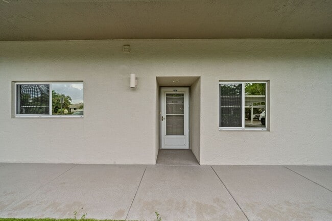 Photo - first-floor unit featuring a 2 bedroom, 2 bath fully furnished House