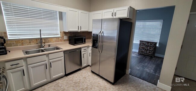 Building Photo - 7877 Audubon Dr