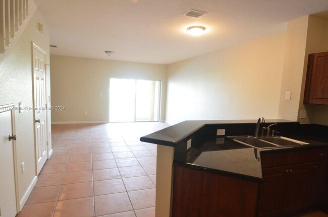 Building Photo - 8899 N Isles Cir