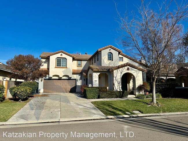 Building Photo - 4 br, 2.5 bath House - 5922 Riverbank Cir.