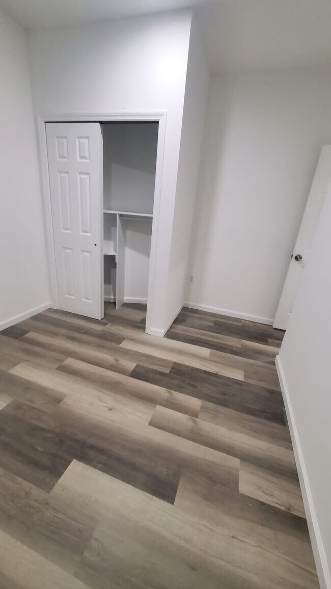Luxury flooring and full size closet. BEDROOM 1 - 3921 108th St