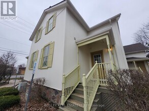 Building Photo - 5958 6th Avenue Wood