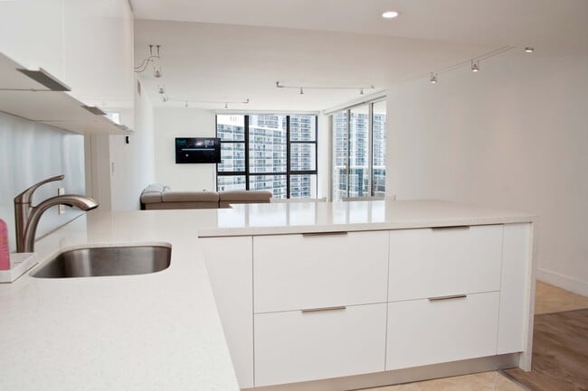 Building Photo - 3675 N Country Club Dr