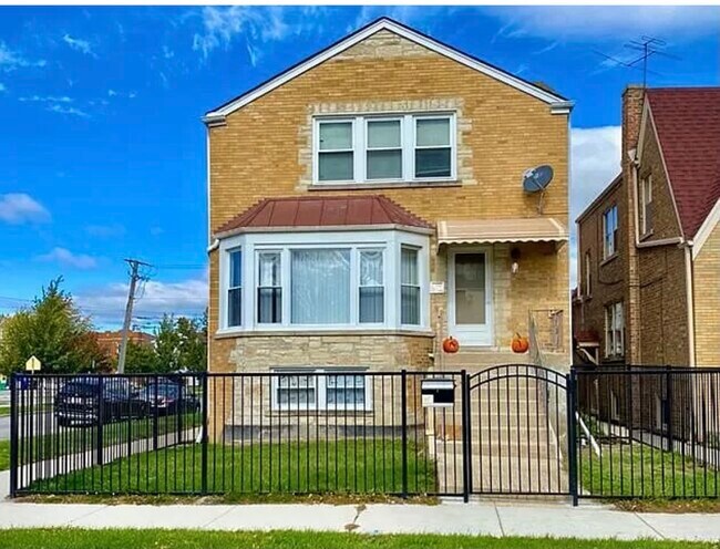 Foto del edificio - 5258 W Henderson St