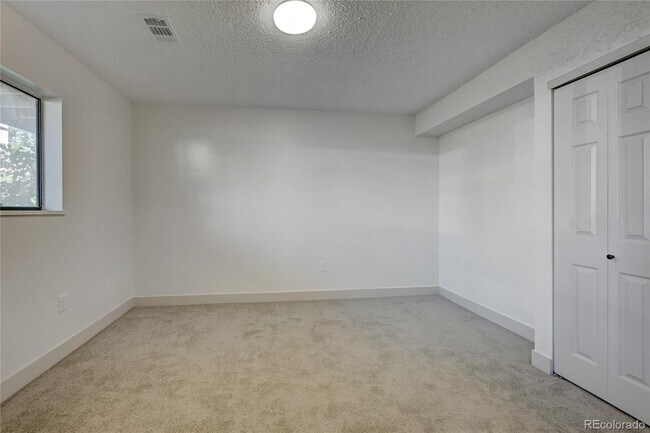 Building Photo - 12028 E Harvard Ave