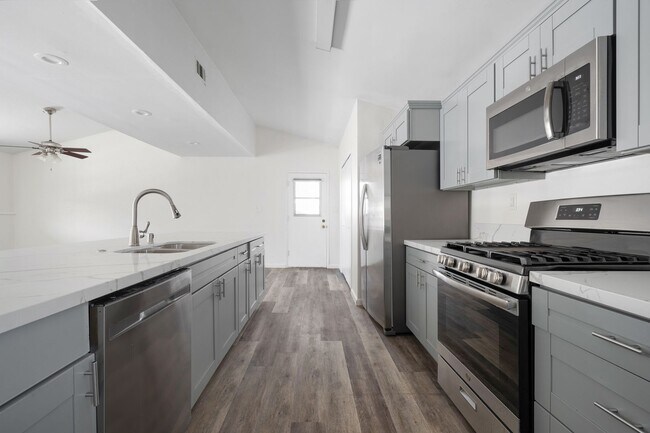 Building Photo - Oversized kitchen and living area!