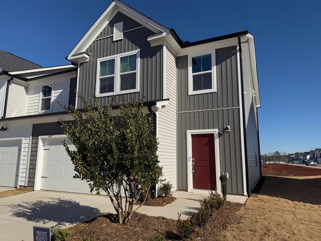 Building Photo - Welcome to this BRAND NEW TOWNHOME- Close ...