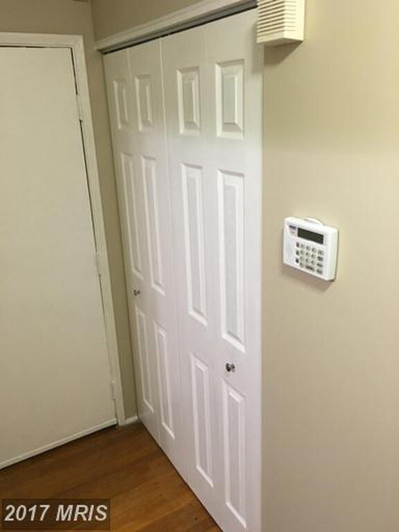 entry hall closet - 1101 Saint Paul St