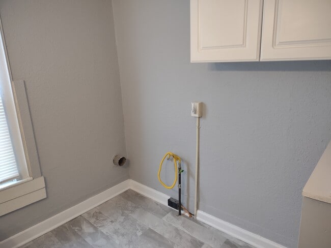 Laundry hookups in bathroom. - 858 3rd St NW
