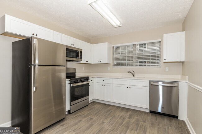 Building Photo - 5485 Denny Dr