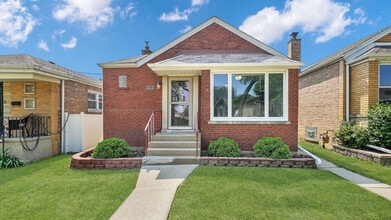 Building Photo - 5542 S Neva Ave