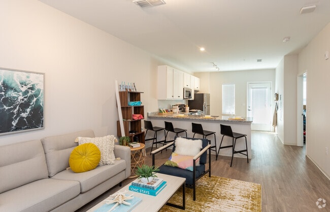 4BR, 4BA - 1533SF Townhome- Living Area - Student | Uncommon Wilmington Apartments